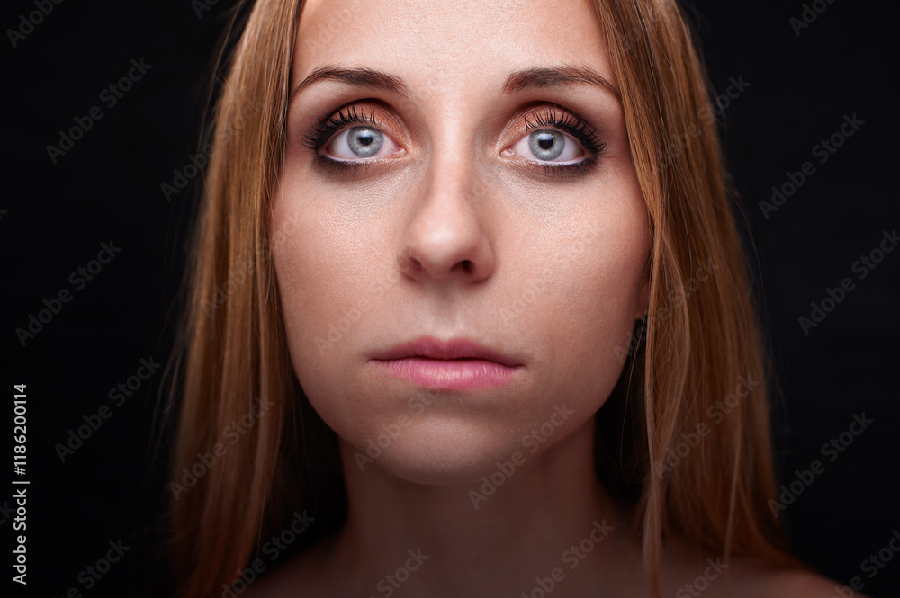 Close-Up Portrait Photograph of a Woman with Bright Blue Eyes and Fair Hair.. Close-Up Portrait Photograph of a Woman with Bright Blue Eyes and Fair Hair..