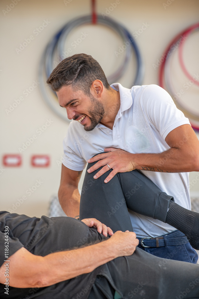 Rehabilitation exercises for legs in the gym. Physiotherapy and Osteopathy