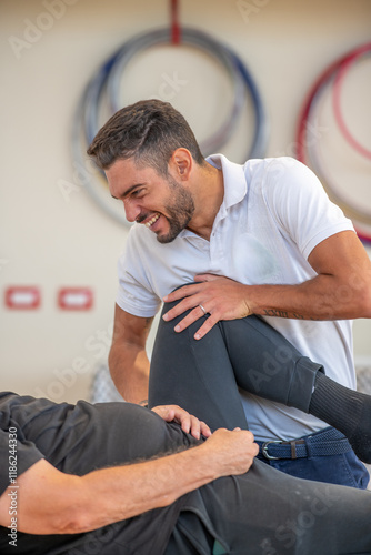 Obraz na płótnie Rehabilitation exercises for legs in the gym. Physiotherapy and Osteopathy w salonie