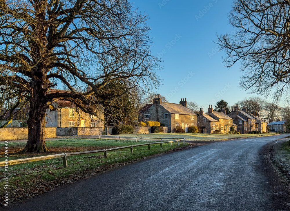 Winter sunlight in the village of Langton in North Yorkshire, United Kingdom. Winter sunlight in the village of Langton in North Yorkshire, United Kingdom.