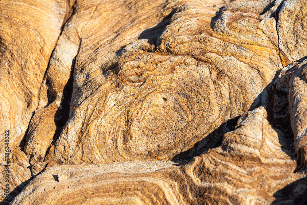 Sea side cliff rocks texture. Amazing abstract photo with the textures created by water during long time in the rocks from Mediterranean Sea.