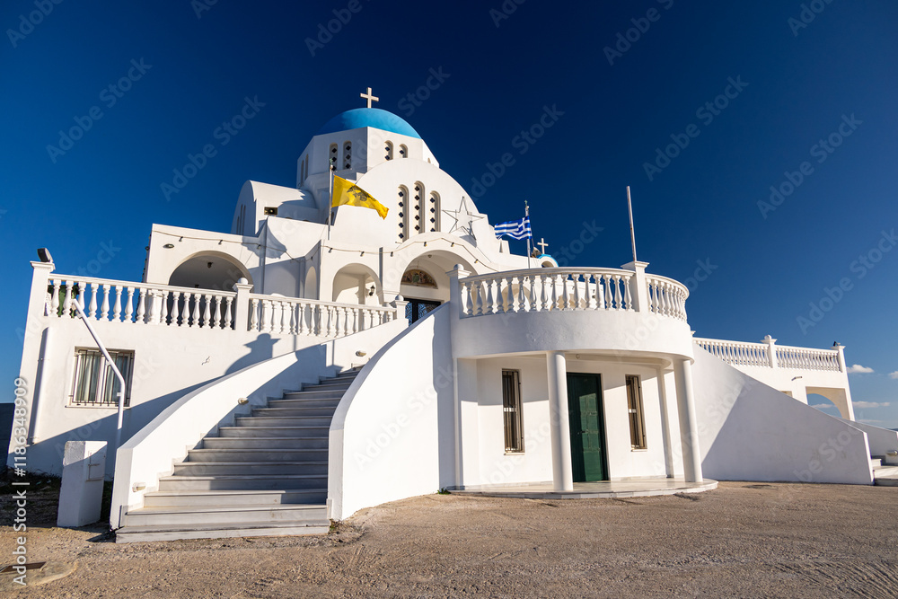 Church of Prophet Elias in Marina Mikrolimanou from Greece. Beautiful landscape photo with this orthodox Greek church against clean blue sky.
