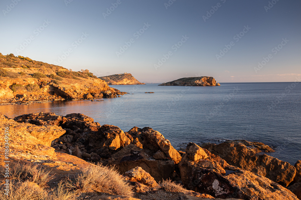 Cape Sounion and Temple of Poseidon. Beautiful sunset over Mediterranean Sea in Greece next to Posideon Temple and Sounion Cape. Amazing landscapes of Greece.