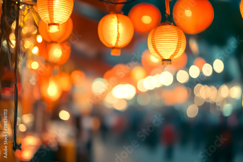 Sparkling orange bokeh with shimmering light in a bustling street market, vibrant stalls and glowing lanterns creating a lively atmosphere photo