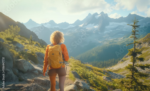 A young woman with curly blonde hair, wearing an orange jacket and a yellow backpack, hikes through a breathtaking alpine landscape with lush greenery and rugged mountains under golden sunlight.