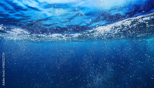 the image is a blue ocean with a lot of blue and white specks