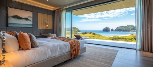 Elegant modern bedroom with beach views featuring soothing colors and chic decor ideal for a luxurious seaside retreat photo