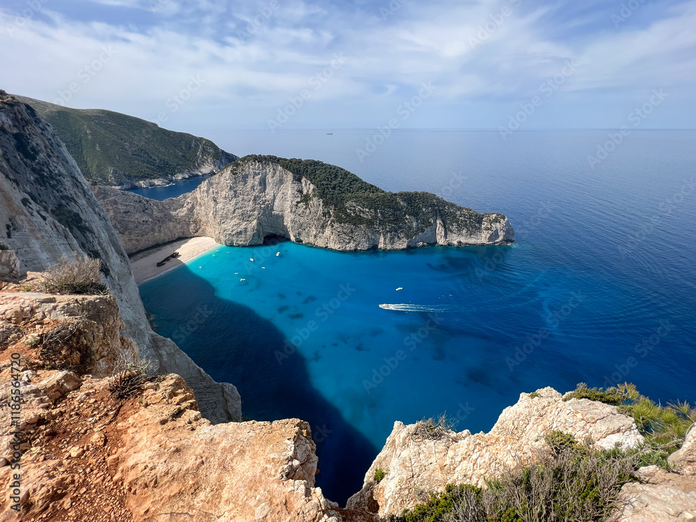 A serene view of boats in crystal-clear waters around Shipwreck Beach. Perfect for illustrating tropical escapes, luxury travel, or coastal adventures. A serene view of boats in crystal-clear waters around Shipwreck Beach. Perfect for illustrating tropical escapes, luxury travel, or coastal adventures.