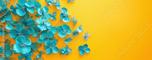 turquoise flowers, yellow background, creative design, spring theme, floral arrangement, vibrant colors, decorative elements Bright yellow serves as a cheerful backdrop for cascading turquoise