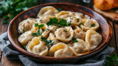 Wallpaper Mural Traditional Russian pelmeni filled with meat served in a wooden bowl garnished with herbs on a rustic table setting Torontodigital.ca