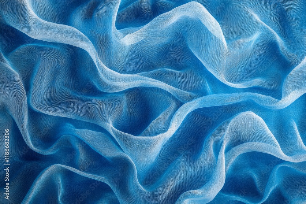 Obraz premium Abstract Blue Silk Fabric Drapes: A Textured Background