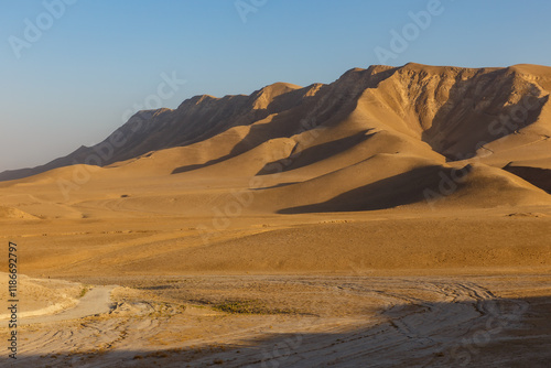 Breathtaking landscape of Kunduz Province showcasing rugged mountains under a clear sky photo