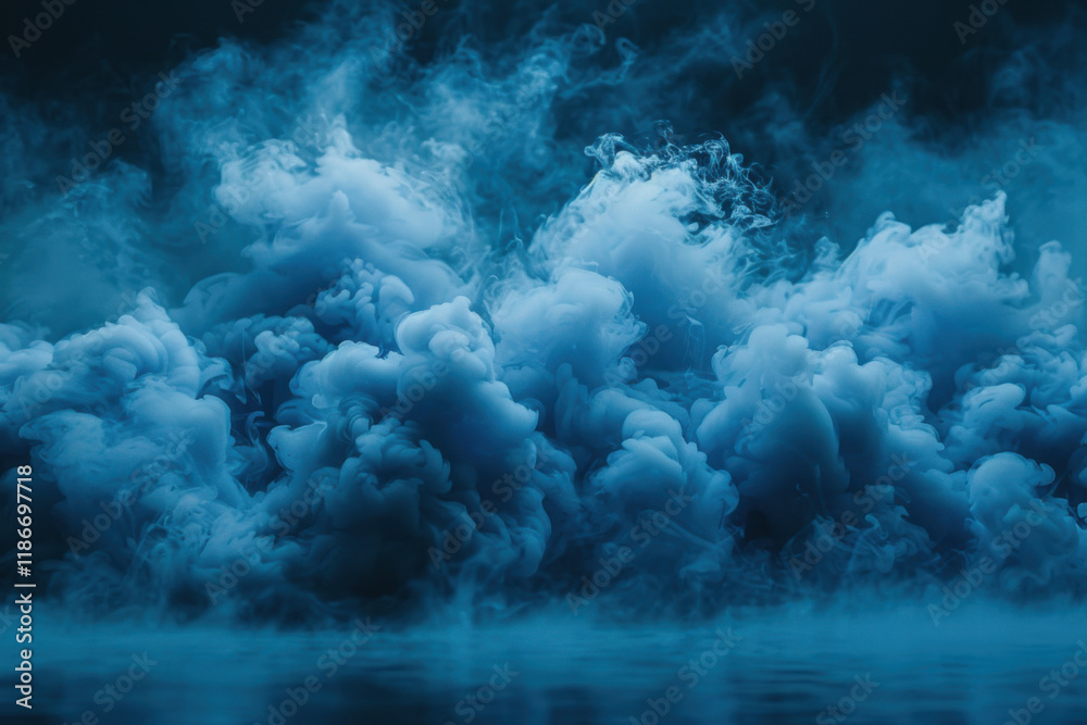 Naklejka premium Blue smoke billows from a smoke bomb creating an ethereal atmosphere in an outdoor setting during a vibrant event
