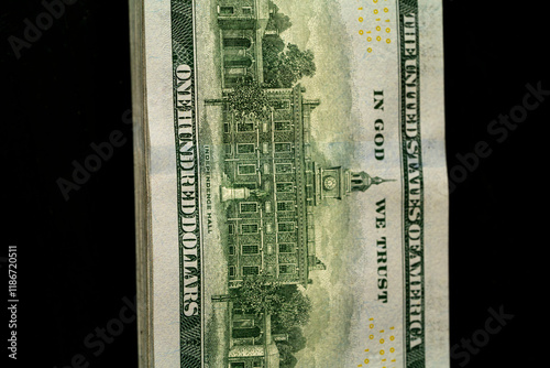 Portrait of a one hundred dollar bill featuring historic architecture photo