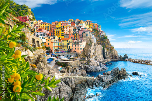 Obraz na płótnie Manarola Village, Cinque Terre Coast of Italy. Manarola a beautiful small town in the province of La Spezia, Liguria, north of Italy and one of the five Cinque terre travel attractions, Sunset colors w salonie