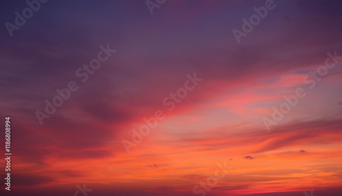 dusk sky with gradient pastel orange and deep crimson sundown afterglow