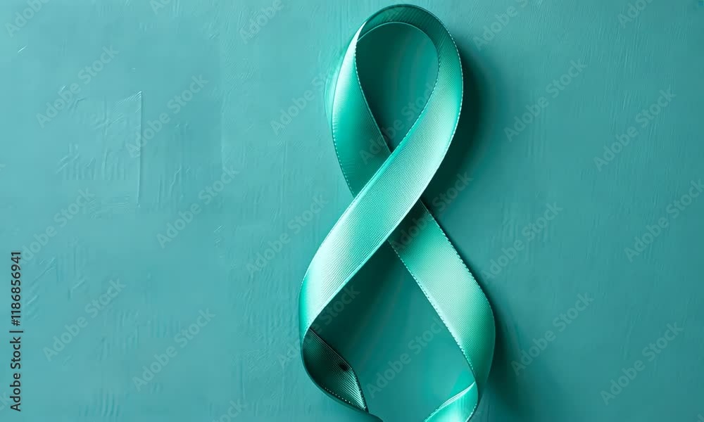 Teal ribbon on textured teal background, symbolizing awareness for ...