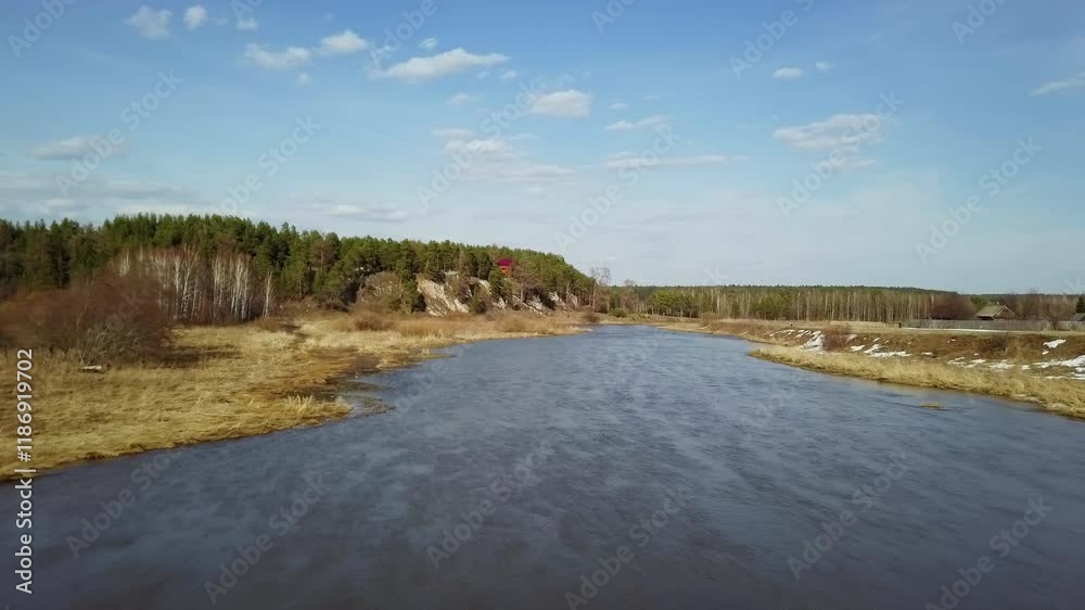A Serene River Landscape Featuring Lush Greenery and Expansive Blue Sky Above It. Clip A Serene River Landscape Featuring Lush Greenery and Expansive Blue Sky Above It. Clip