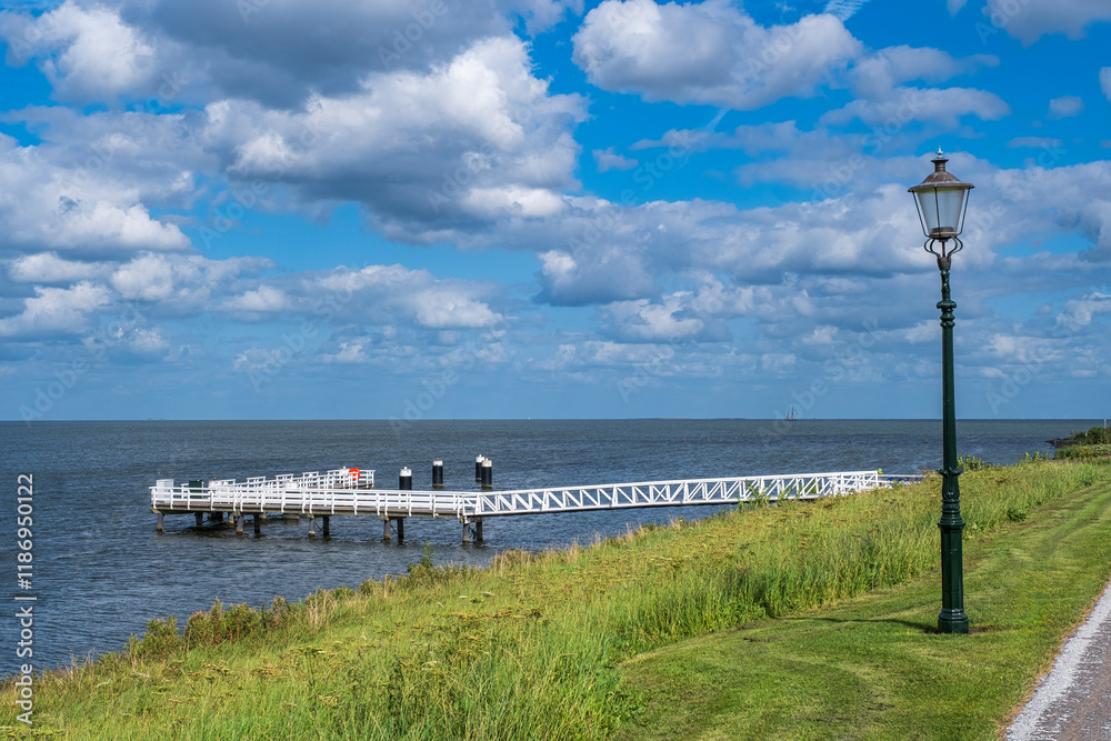 The ship pier near Medemblik NL in the IJsselmeer on a sunny day The ship pier near Medemblik NL in the IJsselmeer on a sunny day
