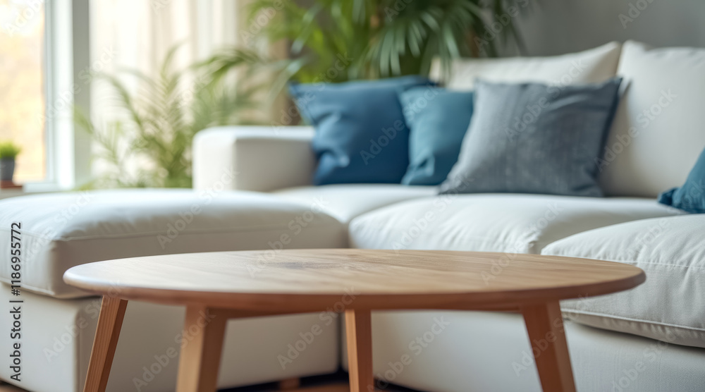 Fototapeta premium light oak wood round table front sectional sofa