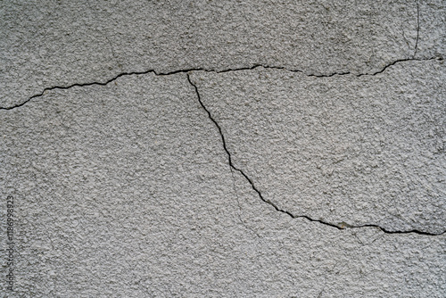 Crack in the old building facade - background for graphics.