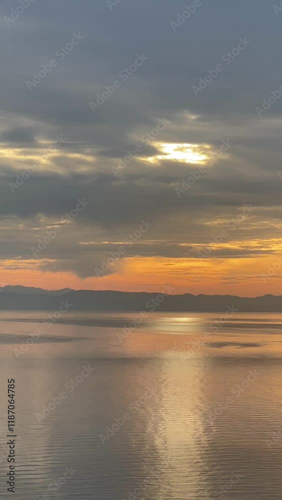 View from Corfu island to the Greek mainland at sunset View from Corfu island to the Greek mainland at sunset