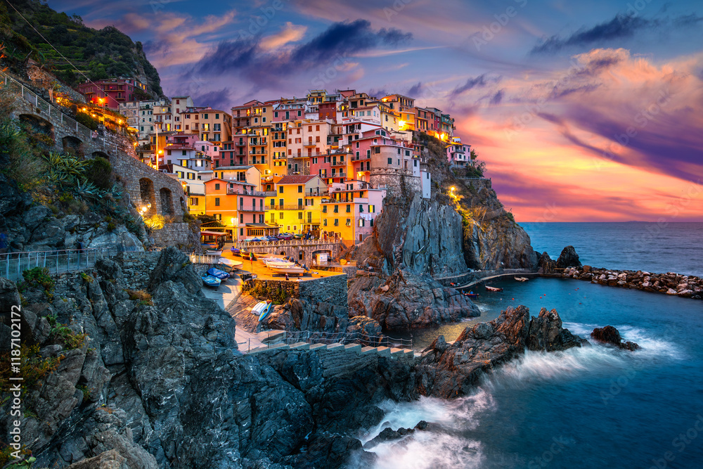 Manarola Village, Cinque Terre Coast of Italy. Manarola a beautiful small town in the province of La Spezia, Liguria, north of Italy and one of the five Cinque terre travel attractions, Sunset colors