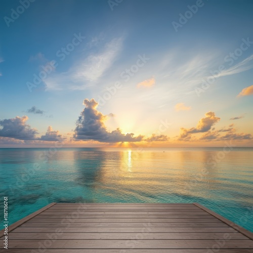 Tropical beach sunset, palm trees silhouette, golden sand, turquoise ocean waves, reflective water surface, vibrant sky colors, dramatic clouds, sun rays, peaceful atmosphere, tranquil seaside, coasta photo