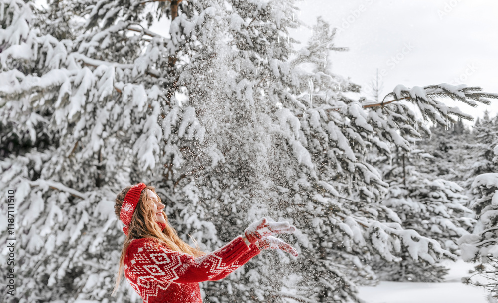 Women in Sweater Playing with Snow in Winter Forest