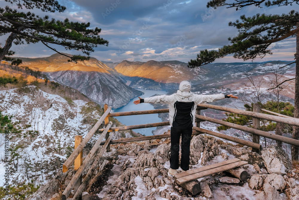 Woman Tourist on Banjska Stena Viewpoint in Winter