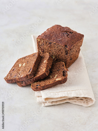 Delicious Modern Bread Loaf Sliced and Served on a Cloth Napkin for a Fresh Dining Experience
