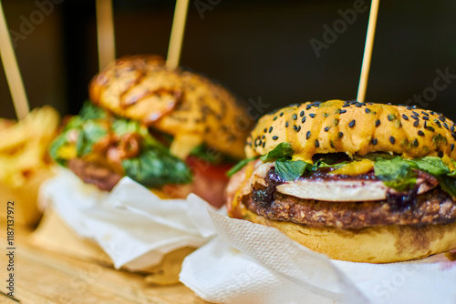 Close-up of delicious burgers during a hamburger food truck festival.
