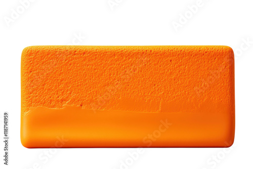 Bright orange block on a white surface showcasing texture and color photo