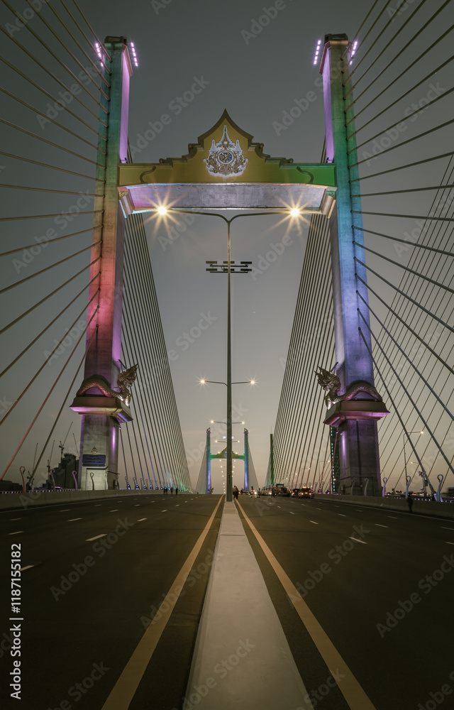 Stunning scenery of Thotsamarachan Bridge or King Rama X Bridge crossing Chao phraya river with evening sky in the background. use it as your Wallpaper, Poster and Space for text, Selective focus.