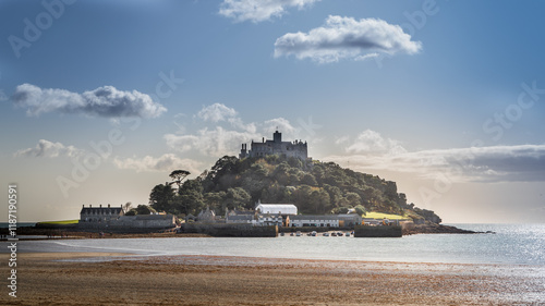Castle, harbor, sunny day, tourists, boats.