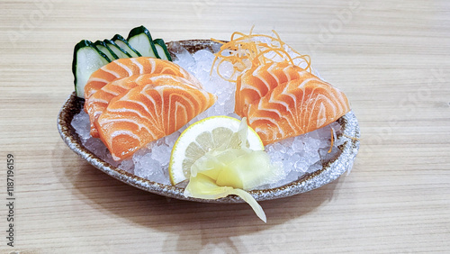 Salmon sashimi on a Japanese style dining table photo