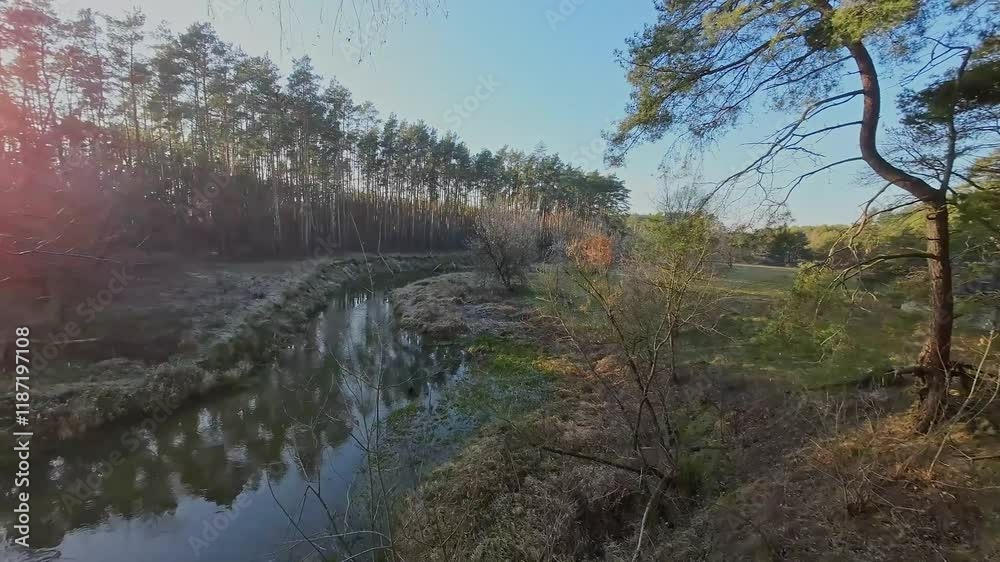 Low flight over a small river on a December day.