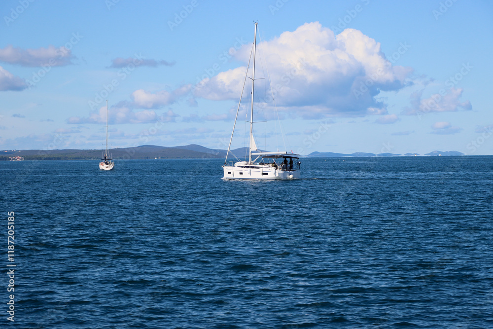 Fototapeta premium sailboats in the sea against the blue sky