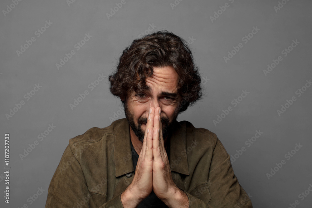 feeling worried, hopeful and religious, praying faithfully with palms pressed, begging forgiveness feeling worried, hopeful and religious, praying faithfully with palms pressed, begging forgiveness