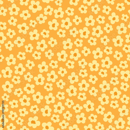 yellow pattern with small flowers. a summer flower meadow with chaotically scattered daisies. cute summer print for fabric