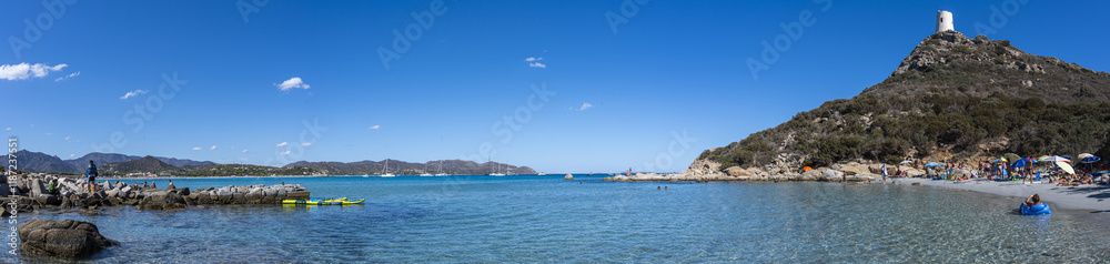 vIllasimius, Italy - 09-05-2024: extra wide view of the beautiful Cala Porto Giunco beach in Villasimius with white sand and crystal clear water