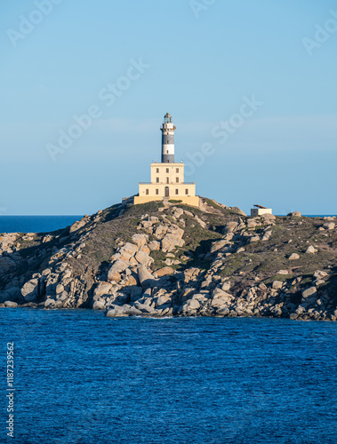 Obraz na płótnie The lighthouse overlooking the cliffs of Isola dei Cavoli in Villasimius w salonie