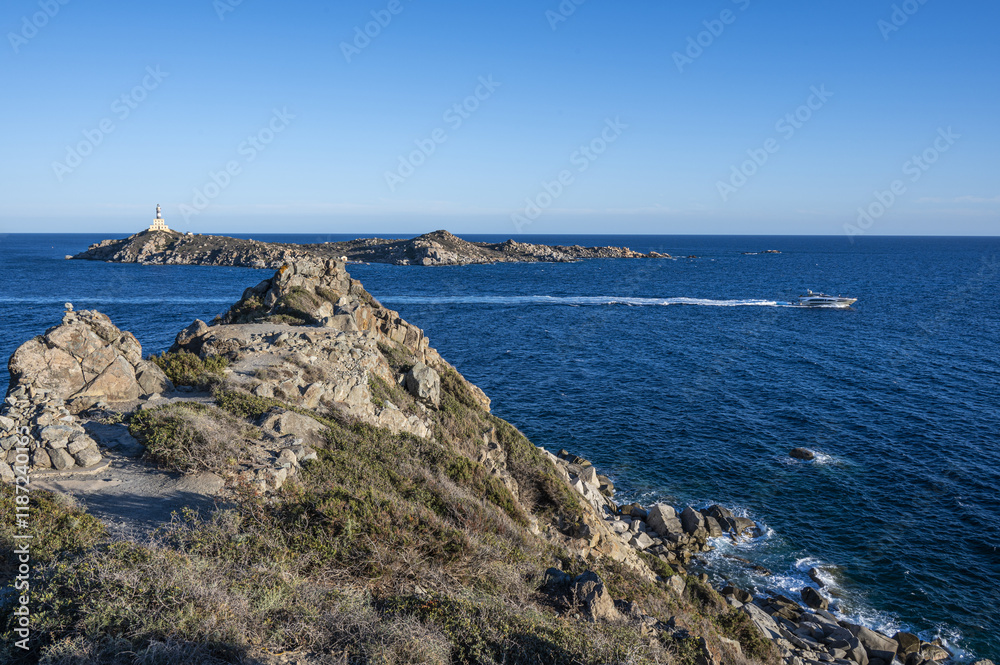 The lighthouse overlooking the cliffs of Isola dei Cavoli in Villasimius