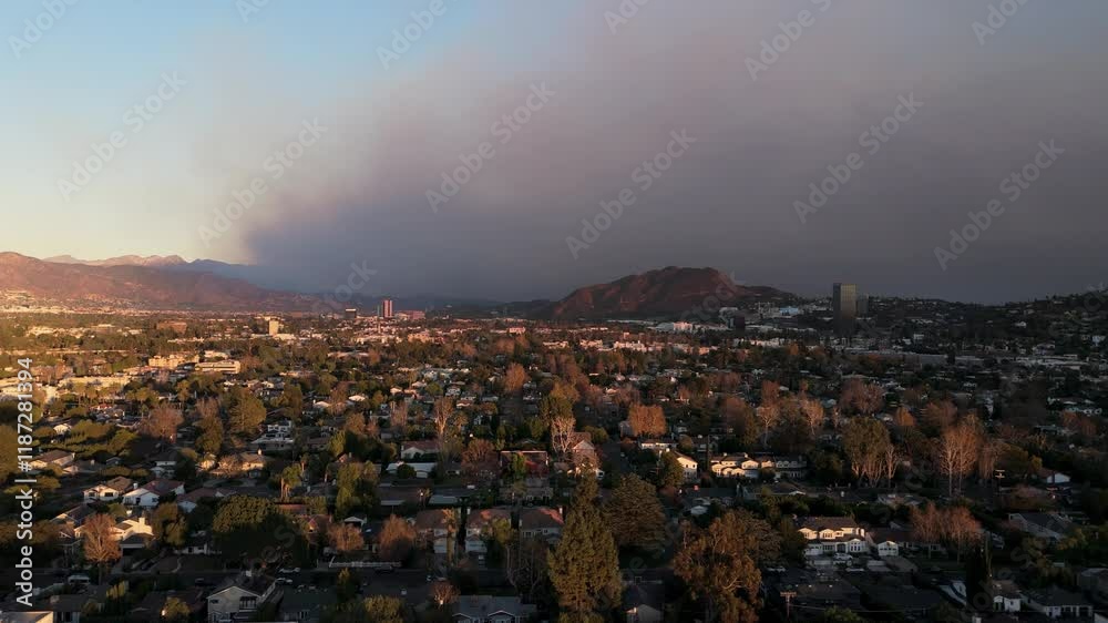 Aerial View Showcasing Urban Area Surrounded by Smoke Rising from Wildfire on the Horizon Aerial View Showcasing Urban Area Surrounded by Smoke Rising from Wildfire on the Horizon