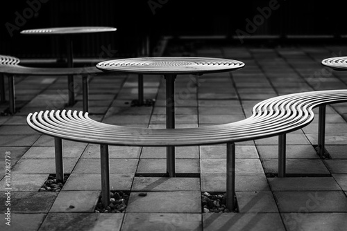 Outdoor metal tables and benches.  Urban design.