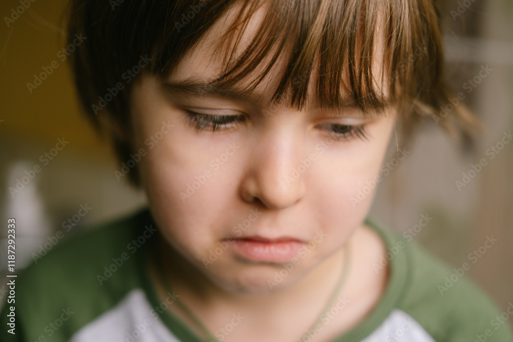 Little boy toddler is sitting alone and suffering an act of bullying. He is upset and feeling stressed. Little boy toddler is sitting alone and suffering an act of bullying. He is upset and feeling stressed.