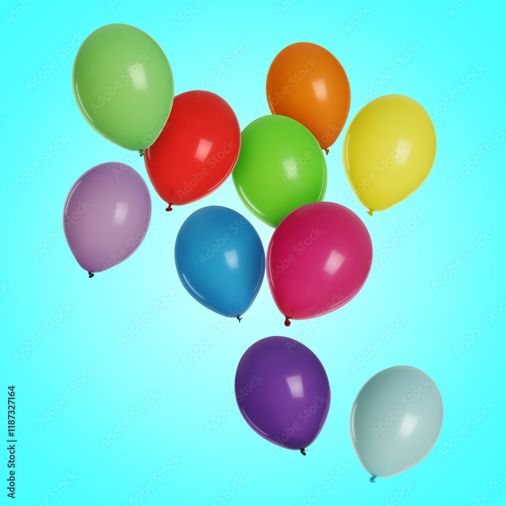 Many colorful balloons in air on light blue background. Birthday or other party decoration Many colorful balloons in air on light blue background. Birthday or other party decoration