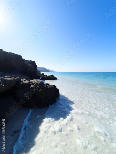 Beautiful view of the sea salt expanse on the beach with a bright atmosphere. clear blue sky, photo