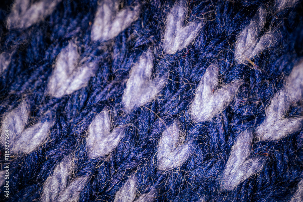 custom made wallpaper toronto digitalA macro view of blue knitted fabric with a repeating white pattern, highlighting the intricate stitching and soft texture. The design creates a cozy and artistic feel.