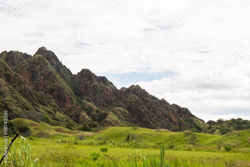 A remarkable view of a synclinal mountain formation in Tesalia, Huila, Colombia, featuring the intricate geological folding of rock layers. This image is perfect for geological studies, educational photo